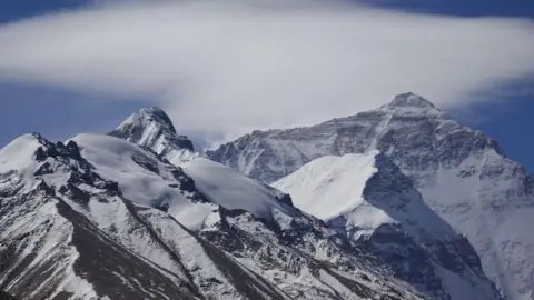 Braving the Elements: Hikers' Harrowing Escape from Everest Blizzard