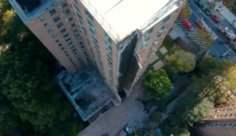 Section of NYC Residential Building Collapses Following Explosion