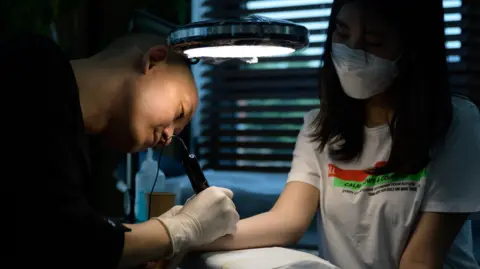 South Korea's Landmark Decision: Non-Medical Tattoo Artists Granted Legality