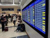 Post-holiday travel chaos ensues as thousands of flights are delayed or canceled due to heavy snow and ice across the Midwest. The Northeast braces for its first significant snowstorm of the season.