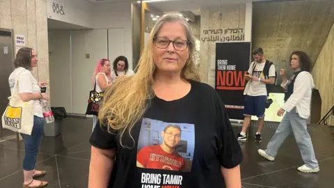 Israeli Hostage's Mother Holds Onto Hope Amid Uncertainty