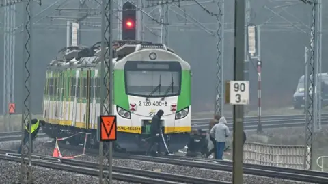 Two Ukrainians Charged in Polish Rail Sabotage Linked to Russian Intelligence