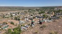 The small town of Añelo in Argentina has experienced a radical transformation due to the fracking boom in the neighboring Vaca Muerta formation, raising questions about the broader implications for the nation's economy and environment.
