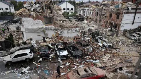 Kyiv Under Siege: Russian Strikes Leave Casualties and Spark Warnings