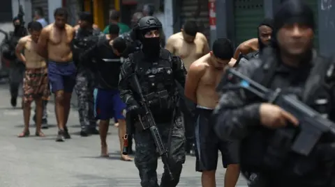 Tragic Aftermath of Rio's Deadliest Police Raid Captured by Photographer