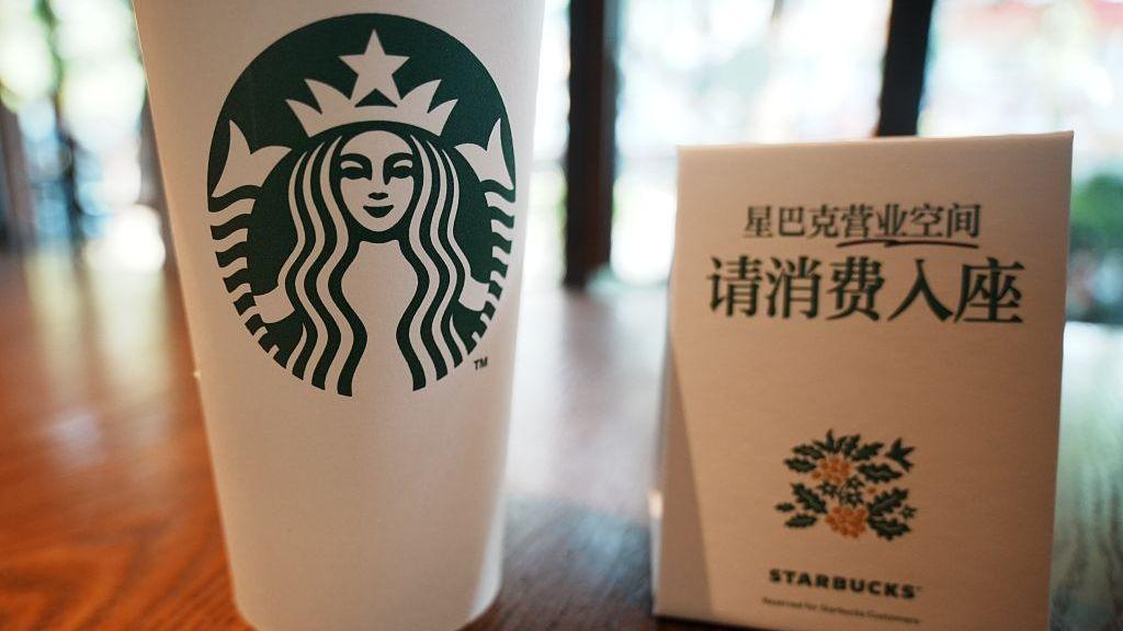 “Purchase to sit” sign in a Starbucks store in China