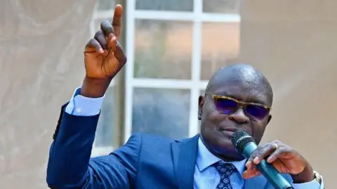 Uganda's Election Chief Faces Intimidation Over Vote Results