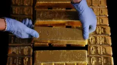 Gold Prices Reach Record High as Investors Seek Safe Haven Amid Uncertainty